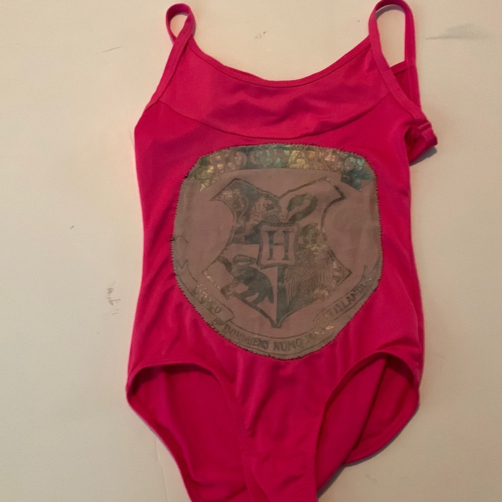 Danskin Pink swimsuit with Hogwarts Harry Potter logo stitched on